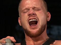 Gay Pictures -  Luke Riley in full leather gets fucked by the Chopper, a motorcycle fucking machine.