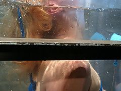 Water Bondage Pictures -  Predicament is shown with a floor mounted dildo and clit-jet