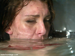 Water Bondage Pictures -  Petite, sexy Jordan finds herself bound in predicament of orgasms