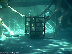 Water Bondage Pictures -  Venus is crucified and left to bake in the hot sun