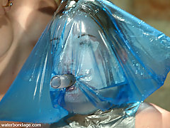 Water Bondage Pictures -  Tied in cross-legged bondage Erika Kole is forced to cum