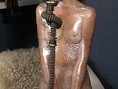 BDSM Pictures -  Master wraps his cute slave in shrink and adds a rubber gas mask for more humiliation